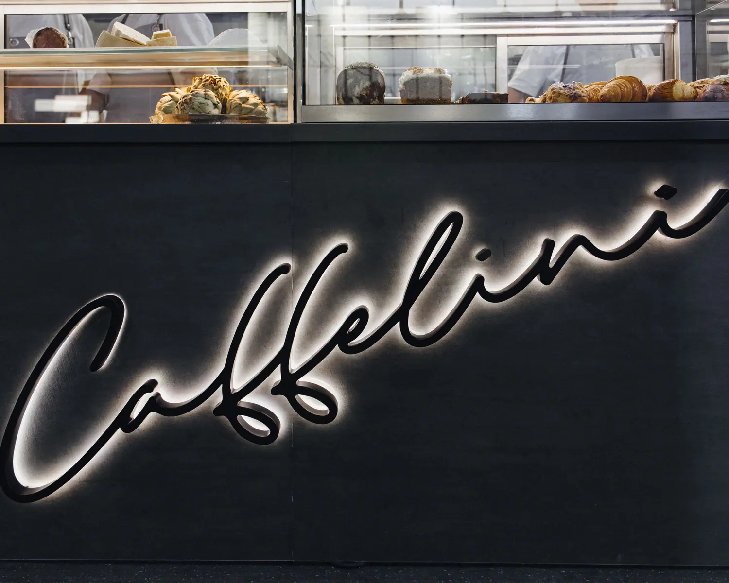 Caffelini neon sign on the counter