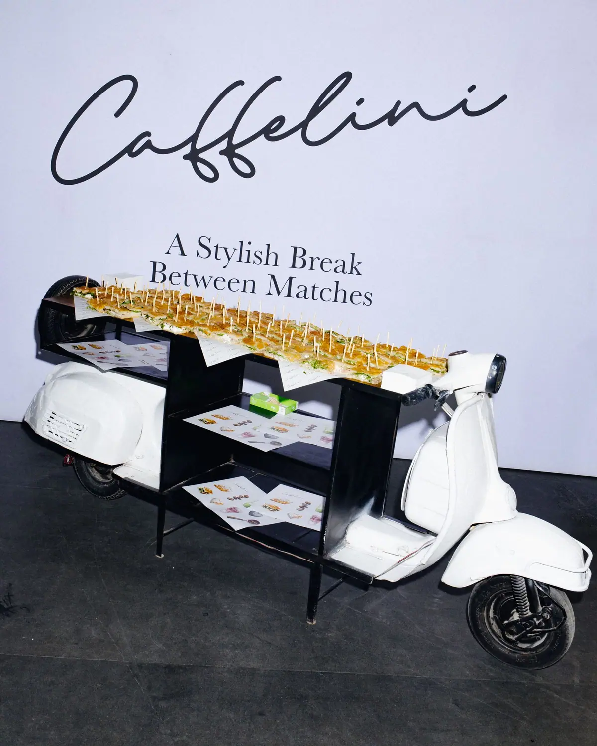 A stylish break between matches — Vespa display